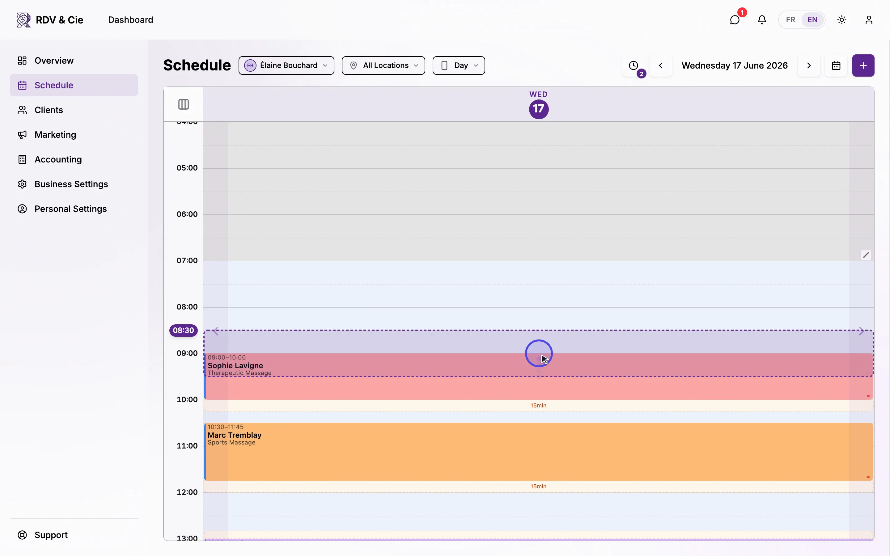 Pressing and holding a booking, dragging it to a free time, then confirming — the booking moves to the new time